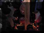 Під час покладання квітів та свічок до памятного знаку жертвам голодоморів та політичних репресій